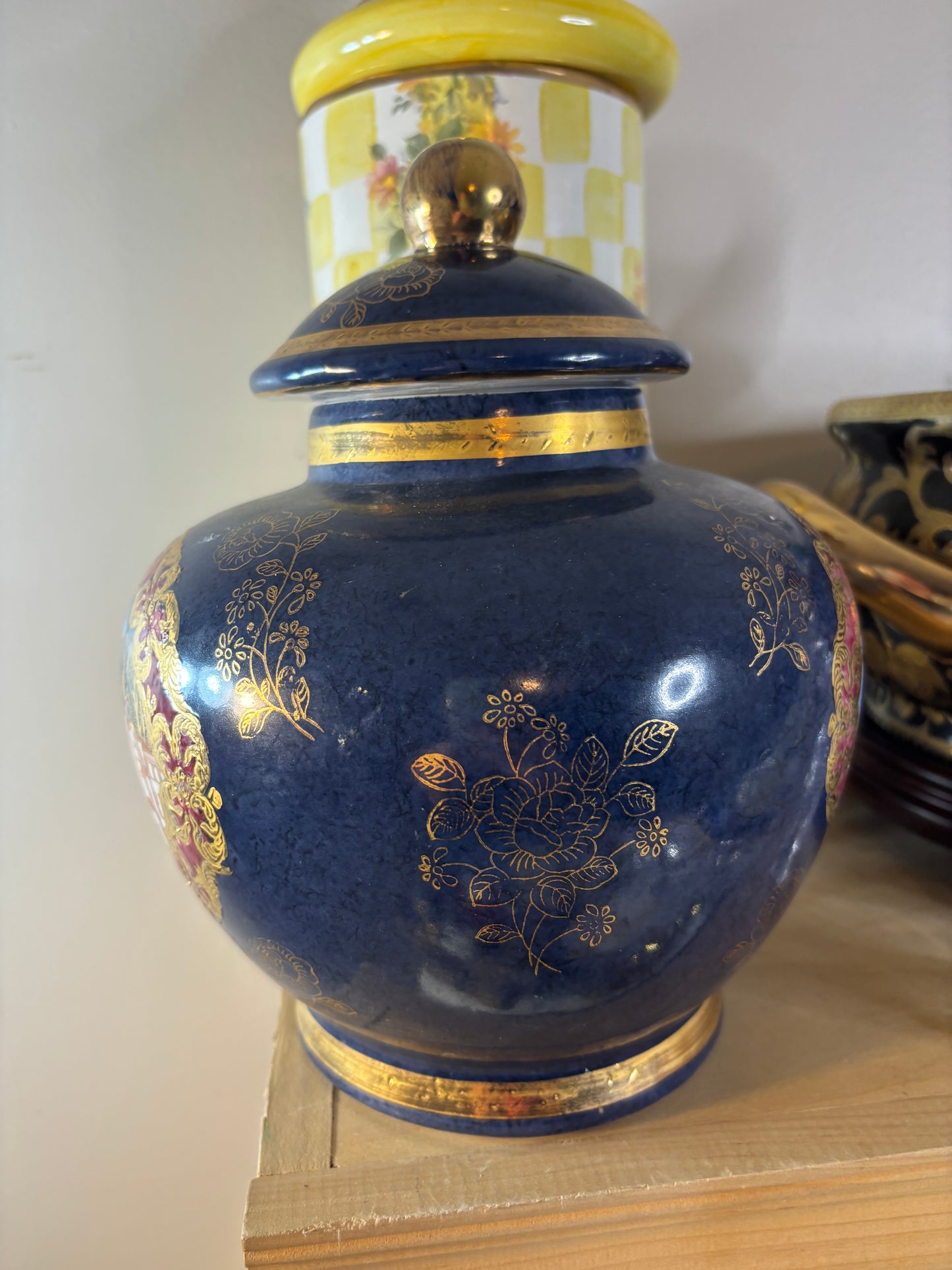Cobalt lidded jar featuring ship scenes and gold details!