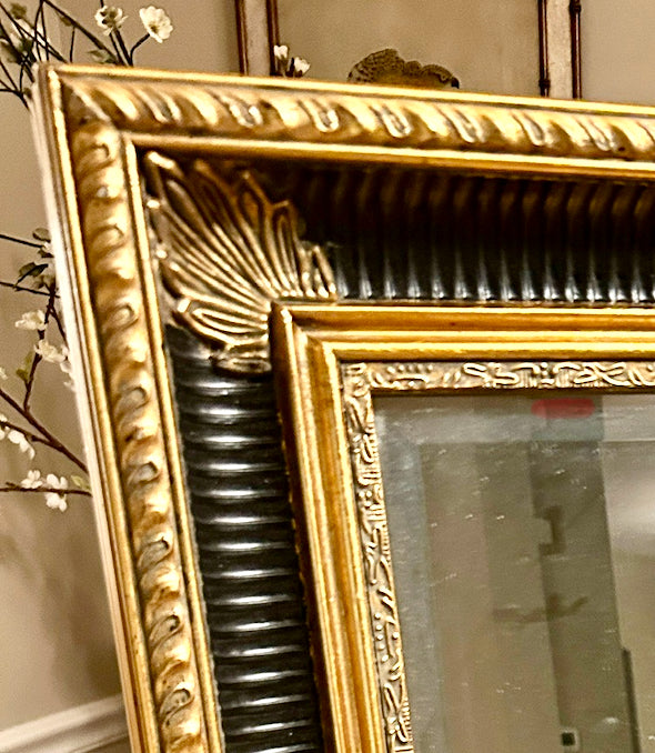 Bold beautiful ebony & gold gilt beveled mirror