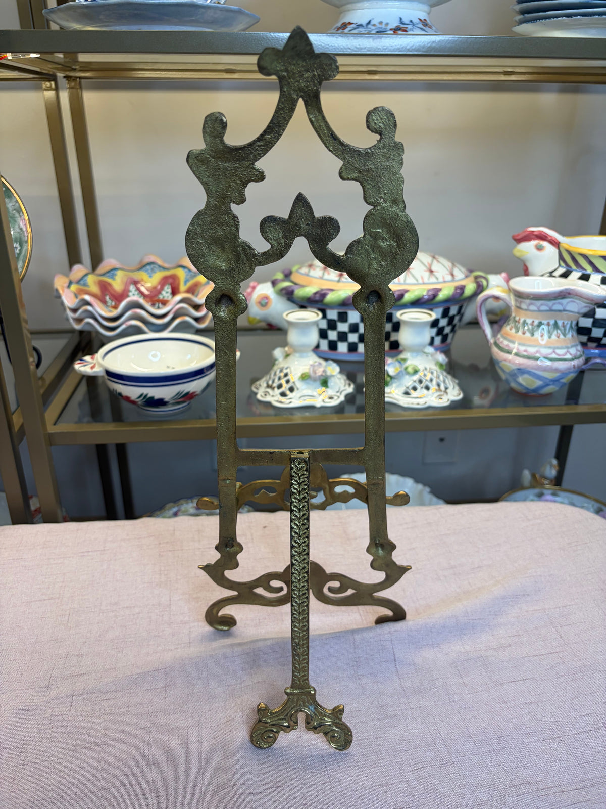 Ornate brass easel with shell motifs!