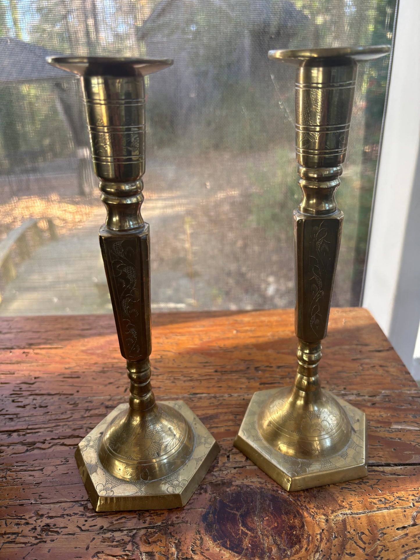 Beautiful pair of etched floral and leaves brass candlesticks!