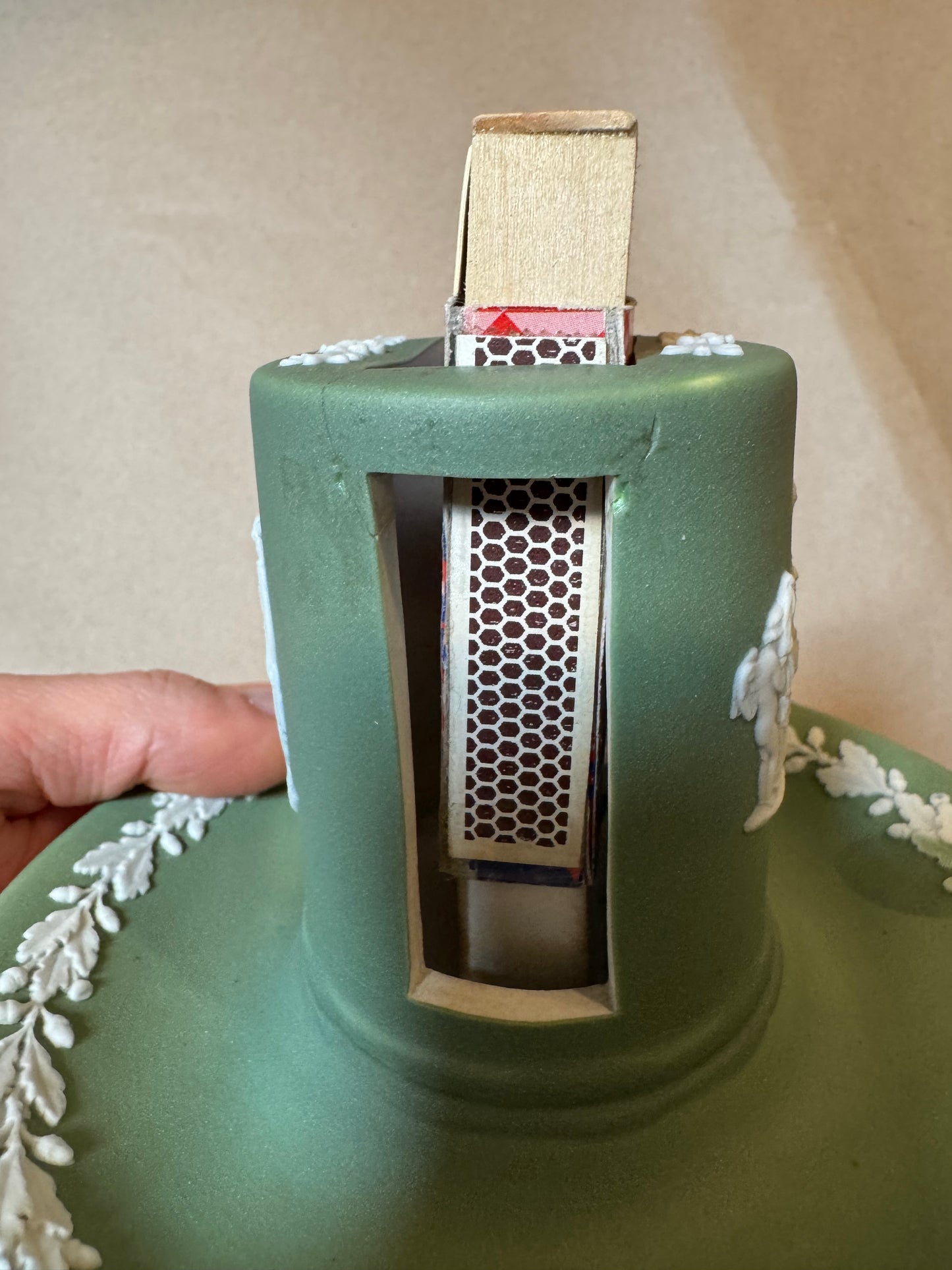 Live 06/15 sage green Wedgwood match holder has repair