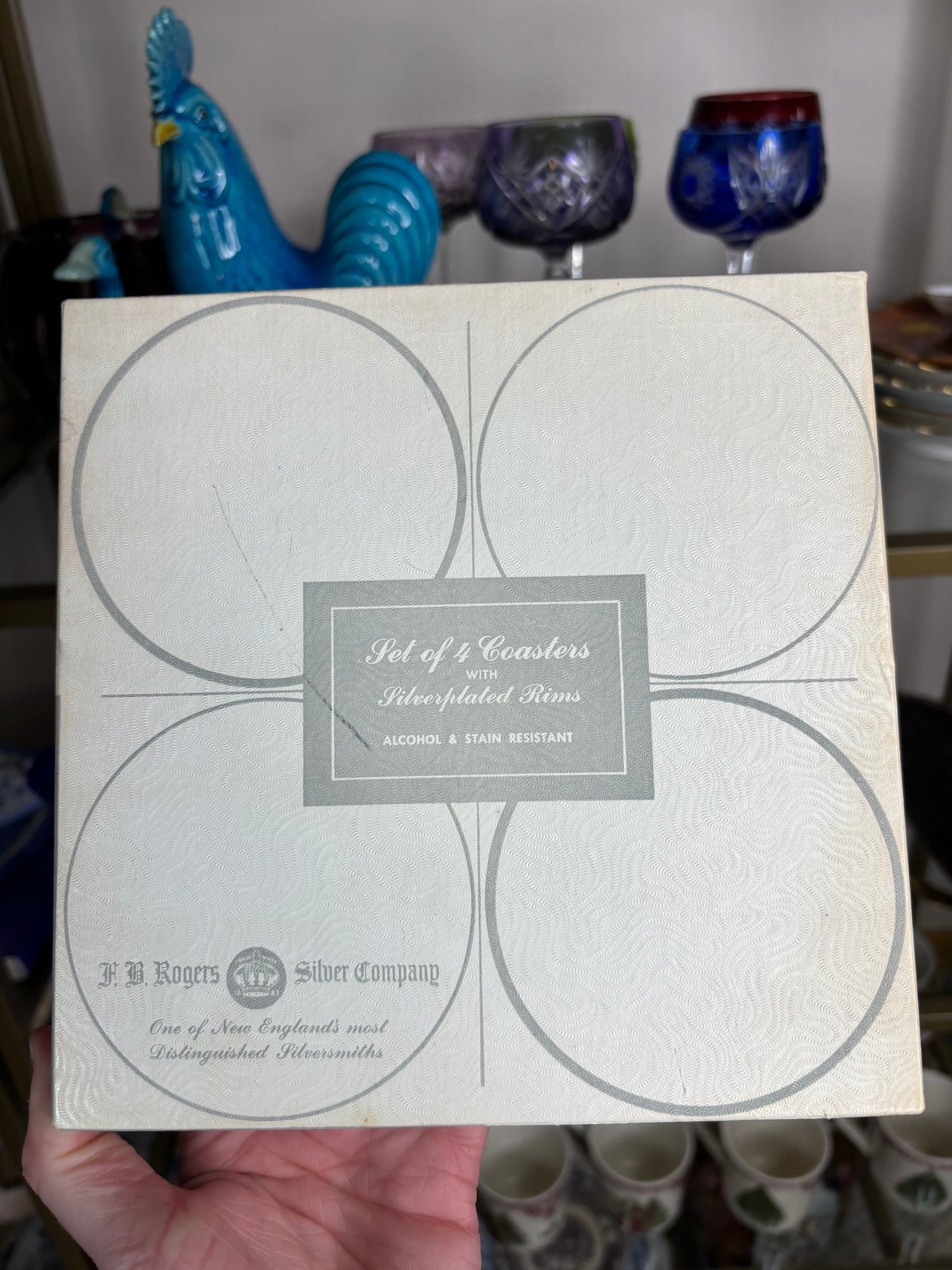 Lovely FB Rogers silverplated and wood style coasters set of 4 in original packaging!