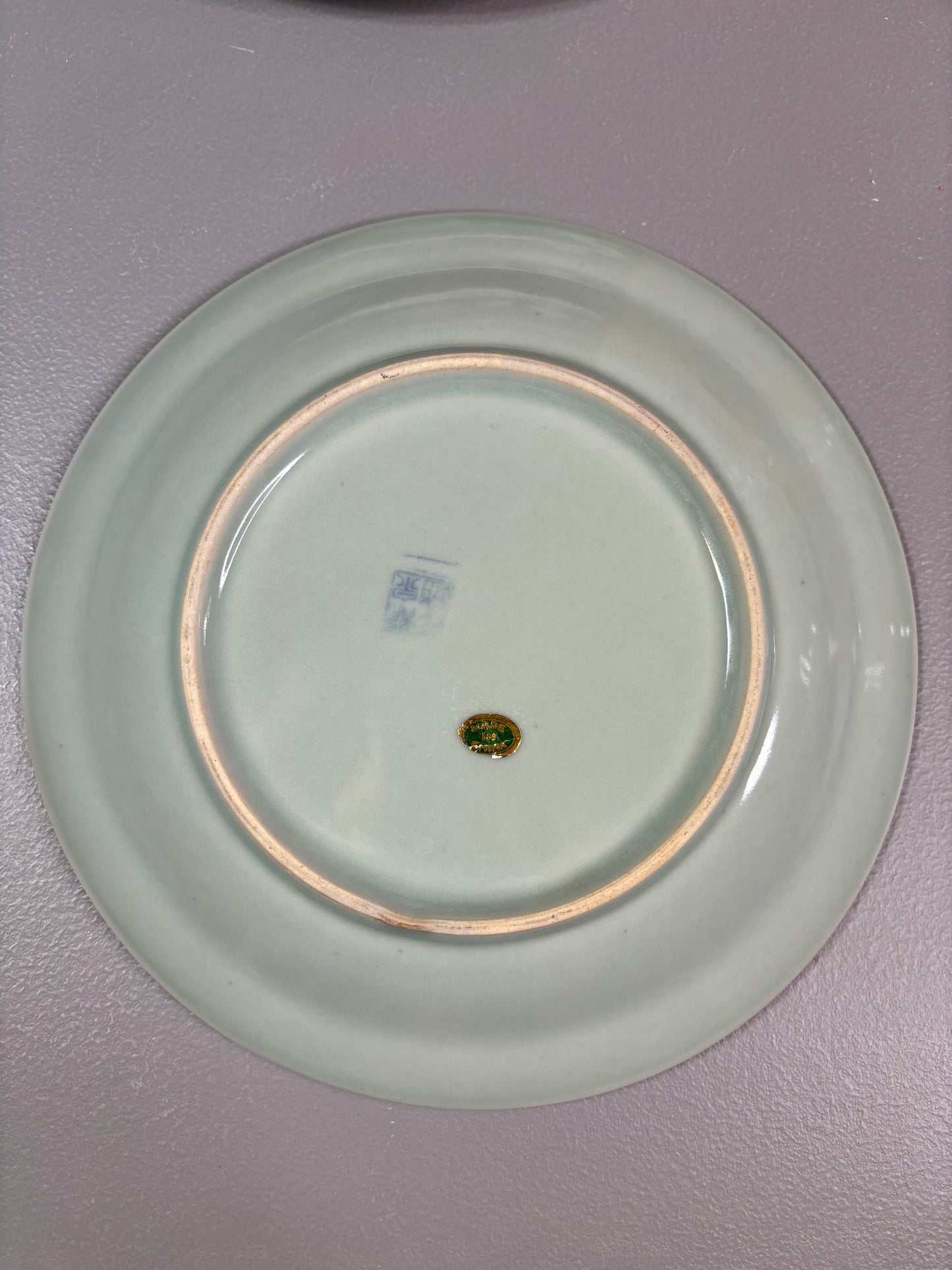 Beautiful celadon plate featuring koi fish!