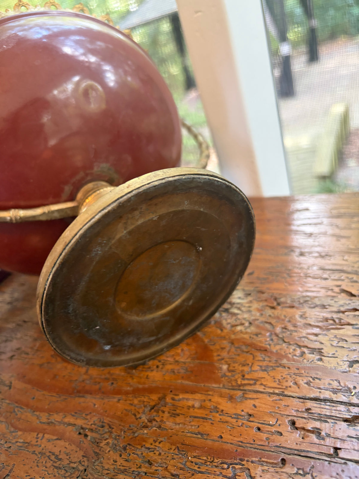 Lovely decorative brass centerpiece bowl or tazza featuring a reddish-maroon enameled body!