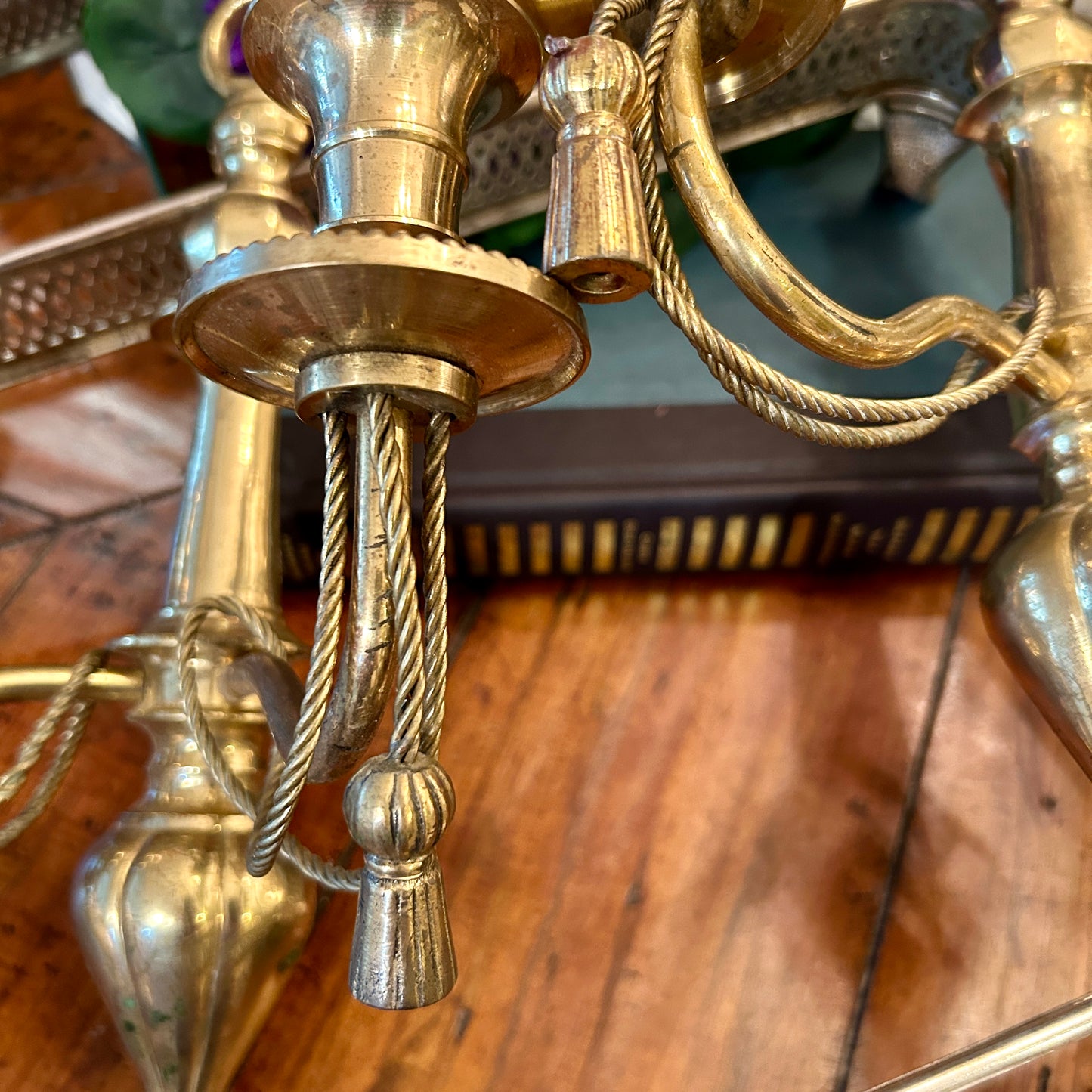 Stunning aged vintage pair of Hollywood Regency brass double wall candelabras.