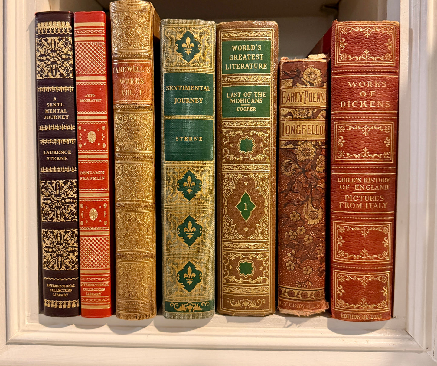 Set of 7 aged rare books Dickens, Longfellow, Sterne & more