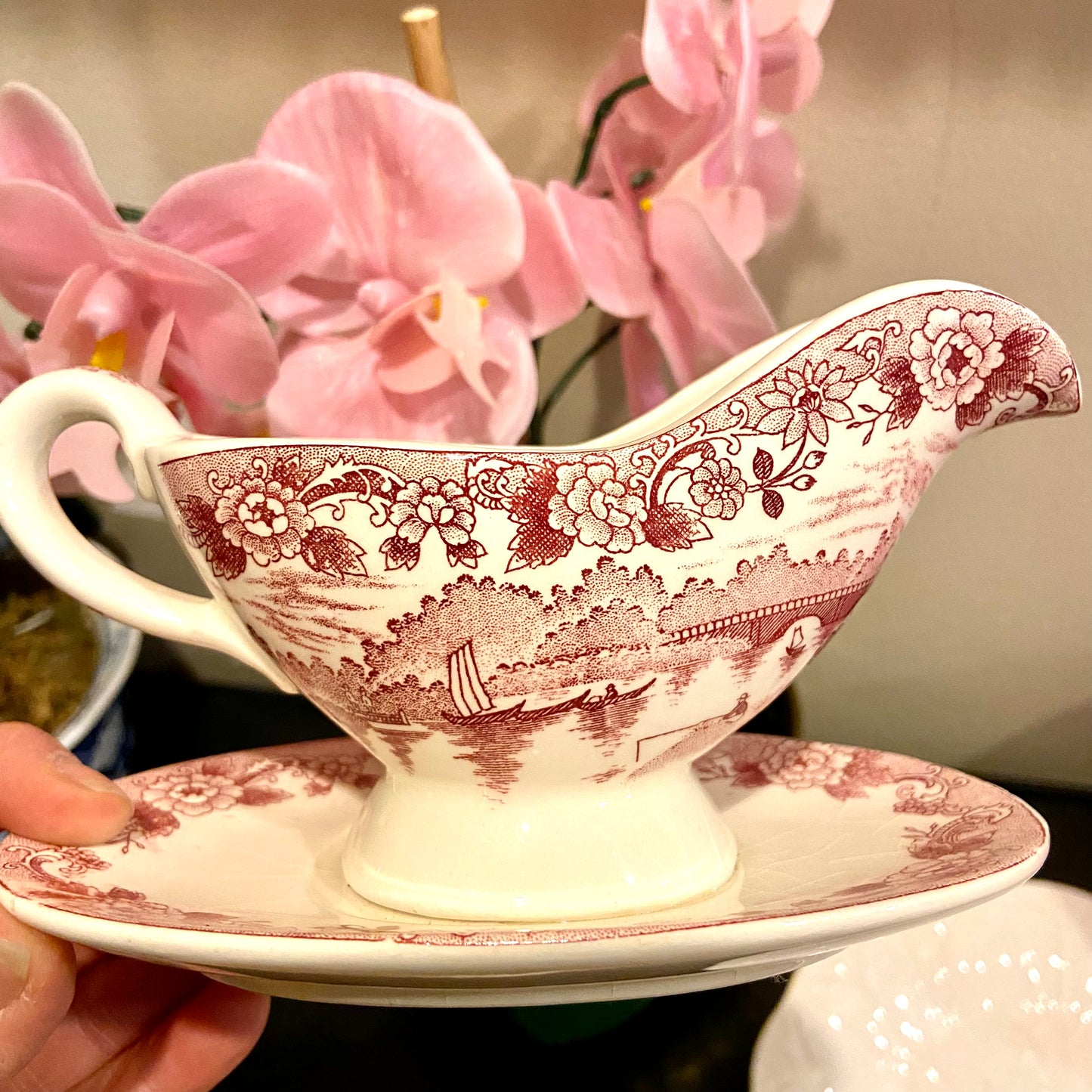 Charming vintage pink willow gravy syrup boat with attached under plate.