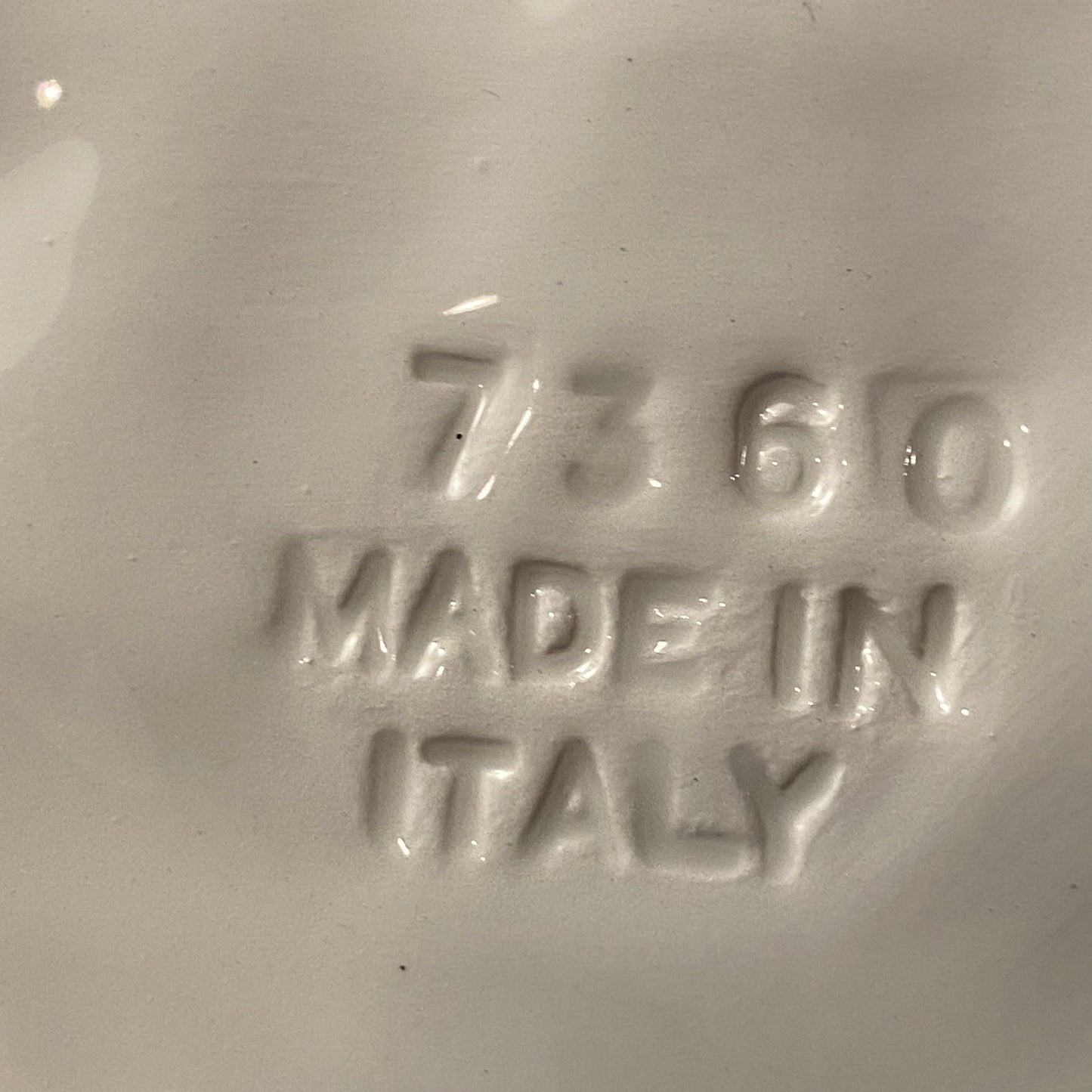 Vintage romantic heart shaped Cupid decorative plate.