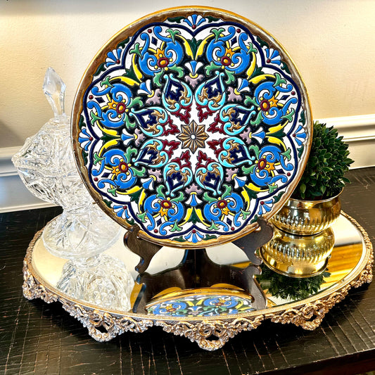Bold, vivid colors highlight this hand painted platter from Seville Spain