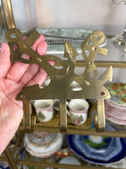 Lovely vintage brass anchors hook!