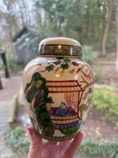 Lovely lidded ginger jar! Features birds, oriental scene, ship, and vibrant colors!