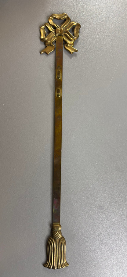 Vintage brass bow and tassel wall plate hanger!