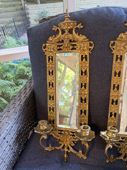 Stunning mirrored brass sconces pair with koi fish, ornate details, and tassel design!