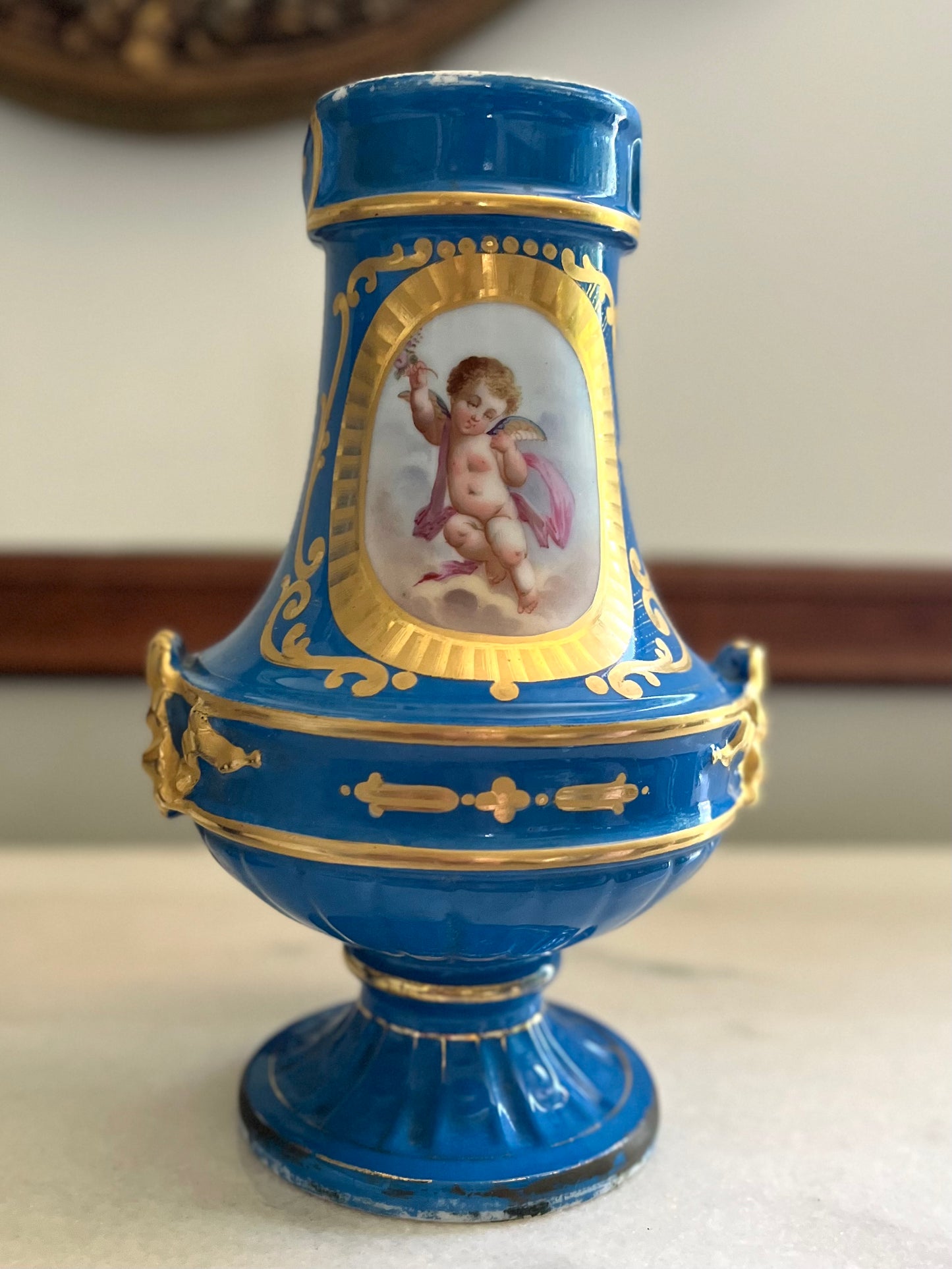 Elegant Pair of Antique 19th Century French Sèvres Style Porcelain Vases In Céleste Bleu With Hand-Painted Putti And Florals