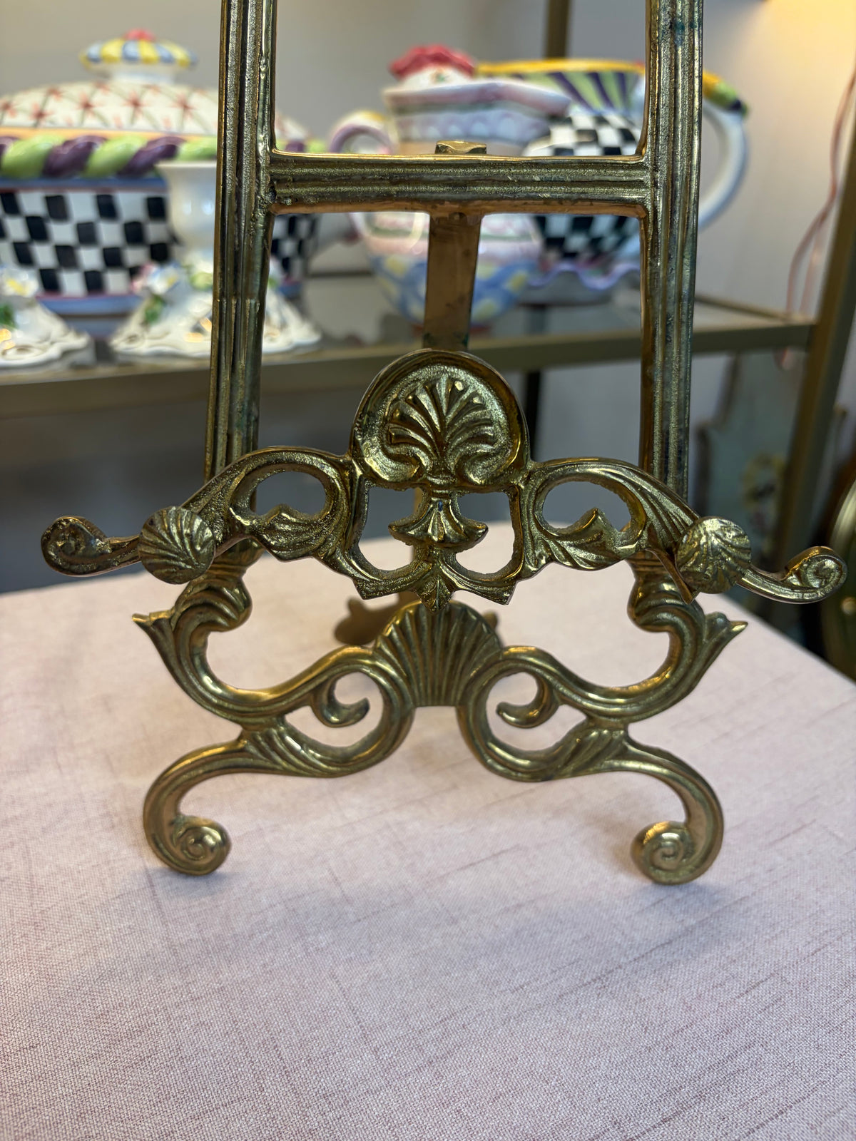 Ornate brass easel with shell motifs!