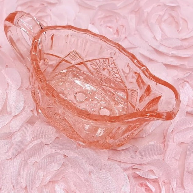 Vintage pink depression glass creamer and sugar
