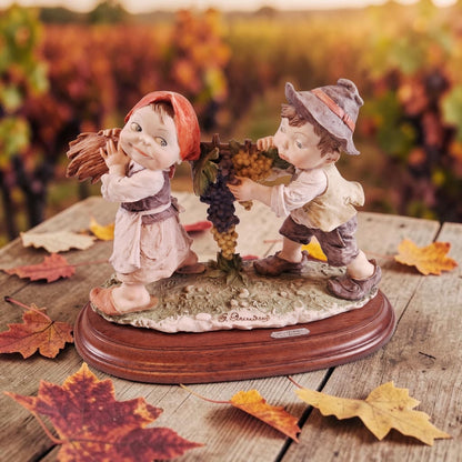 Authentic Boy and Girl Figurine on Wood Base, Signed by Artist