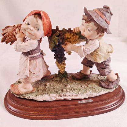 Authentic Boy and Girl Figurine on Wood Base, Signed by Artist