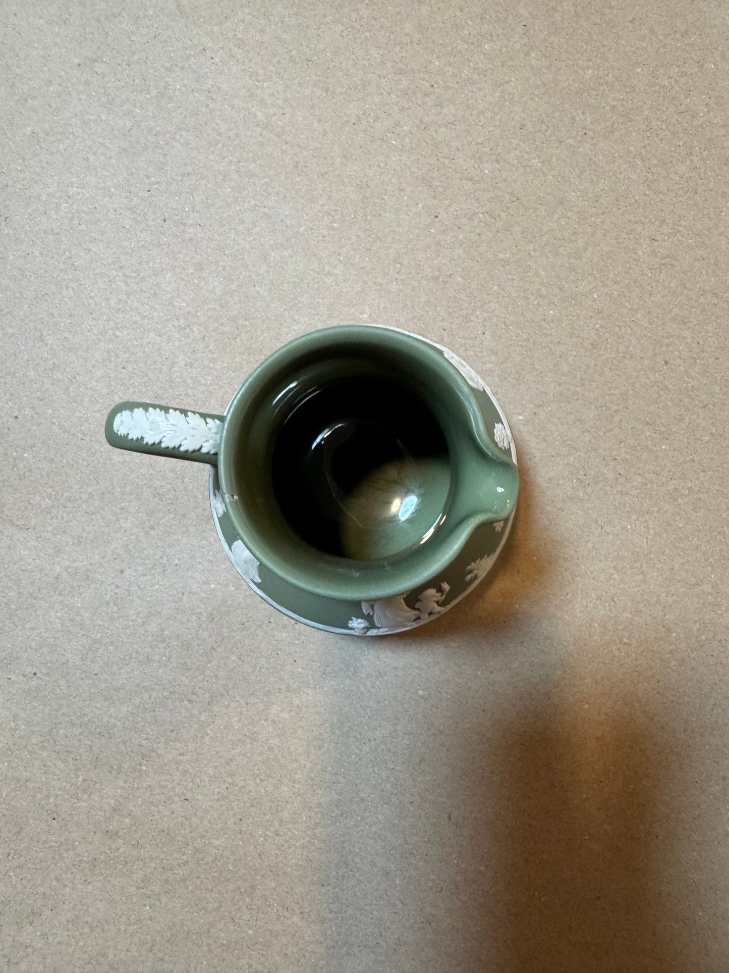 Live 06/15 sage green Wedgwood pitcher has repair