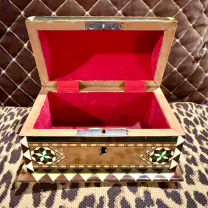 Charming inlaid wood lidded box.