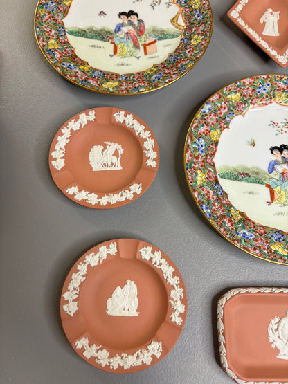 Beautiful instant plate wall! Includes 3 Famille Rose plates and 6 Wedgwood terra cotta dishes!