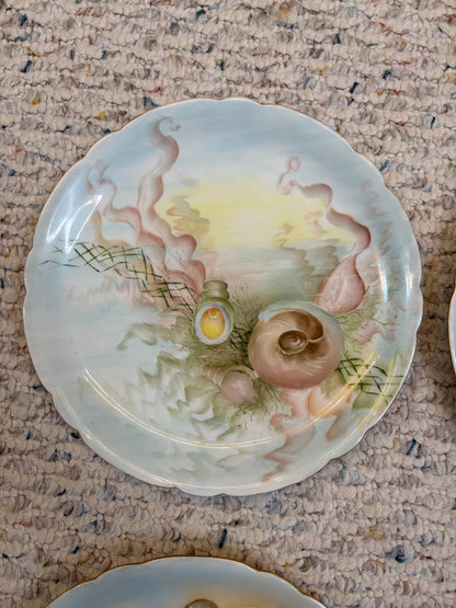 Gorgeous handpainted Limoges shell plates set of 4!