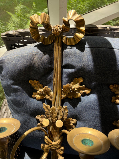 Stunning antique pair of French Louis XVI style brass wall sconces with bows, tassels, and horn motif designs!
