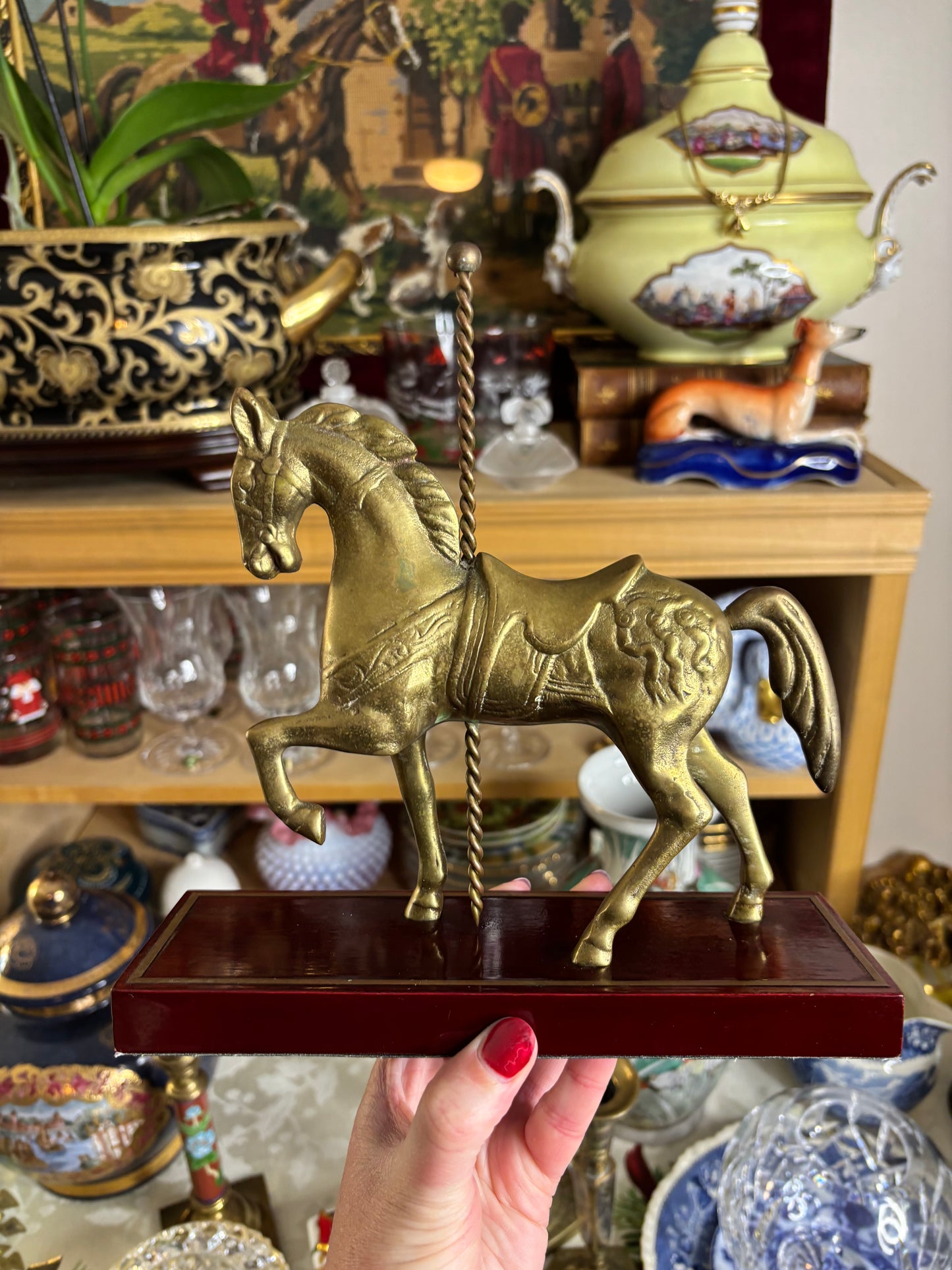 Brass carousel horse on wood!