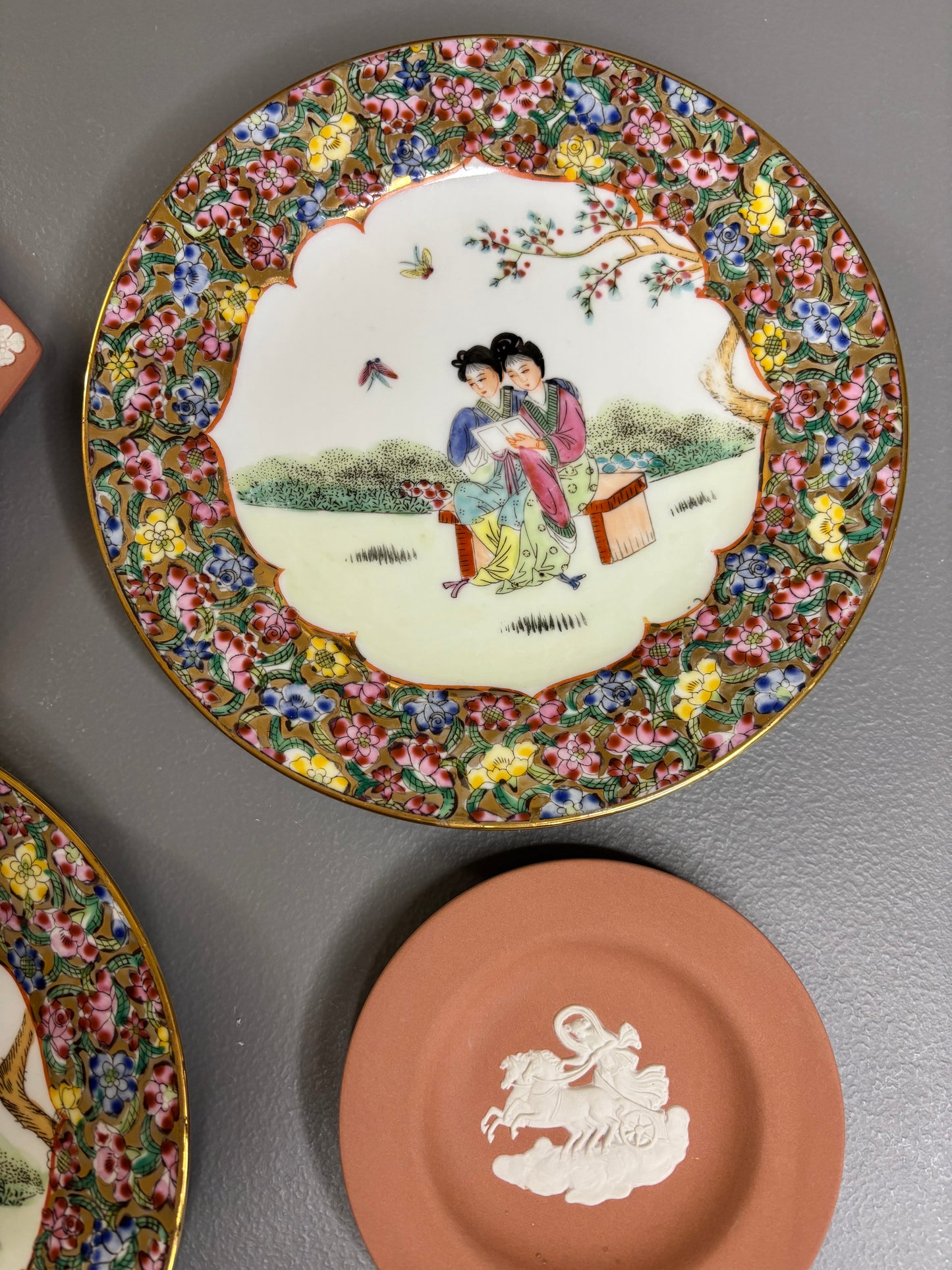 Beautiful instant plate wall! Includes 3 Famille Rose plates and 6 Wedgwood terra cotta dishes!