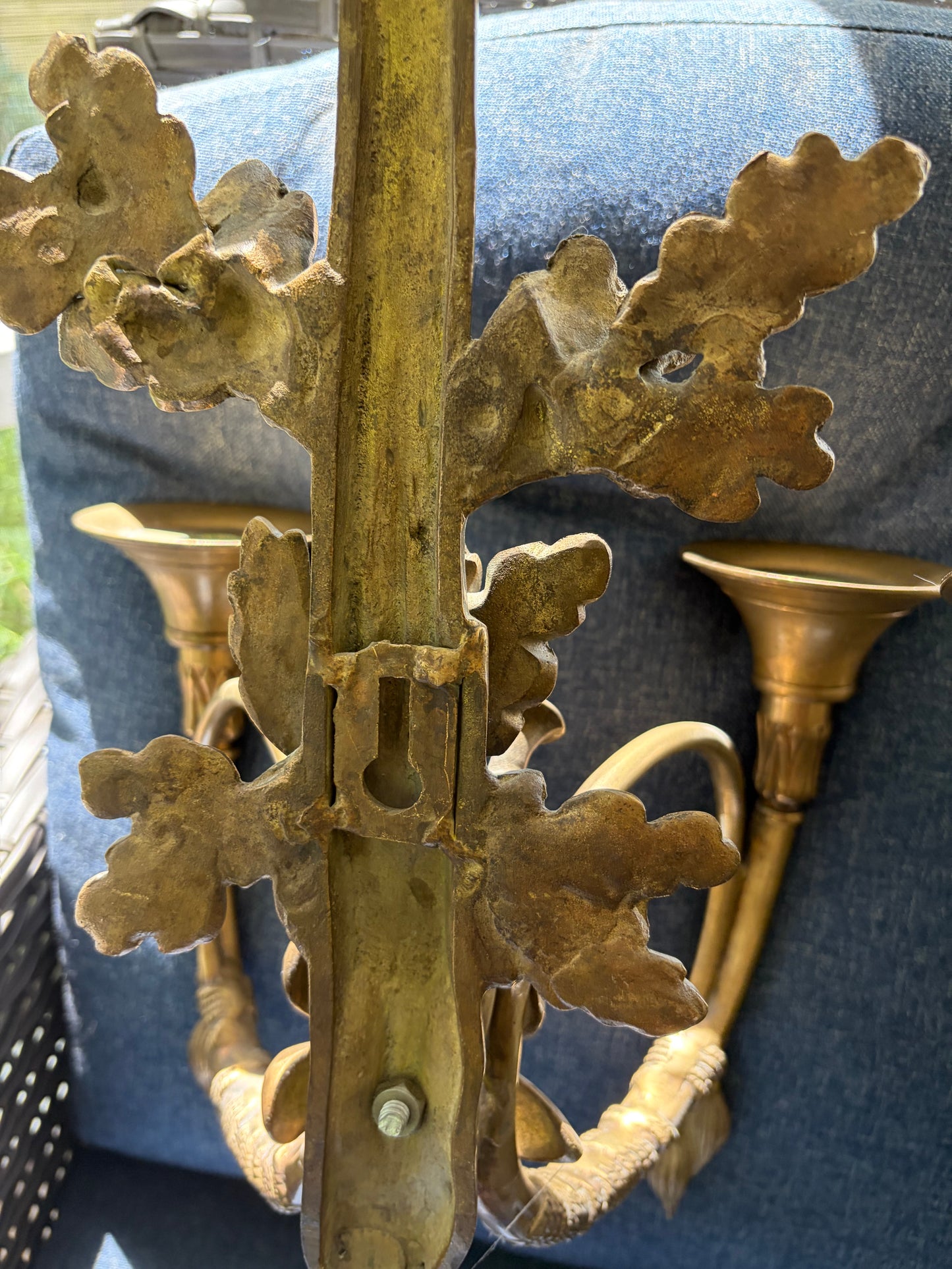 Stunning antique pair of French Louis XVI style brass wall sconces with bows, tassels, and horn motif designs!