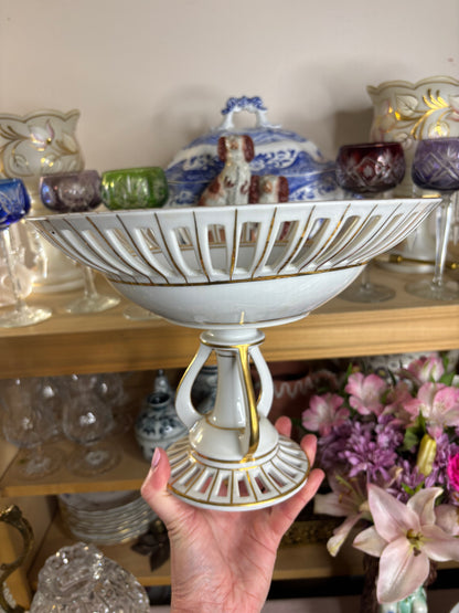 Stunning reticulated large compote with gold trim and designed base!