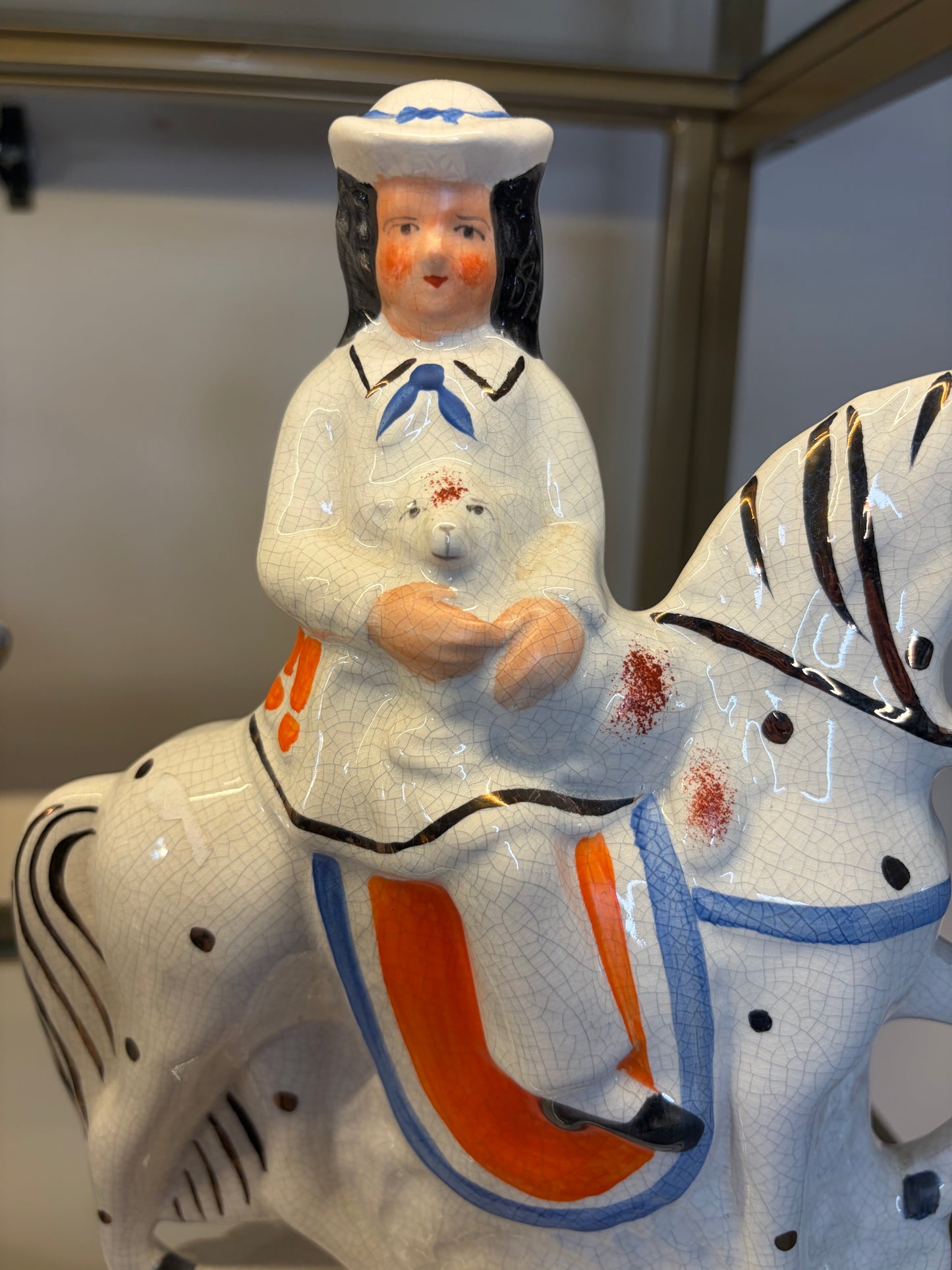 Lovely Staffordshire figurine on horse of girl holding a lamb!