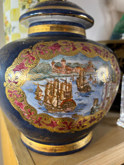 Cobalt lidded jar featuring ship scenes and gold details!