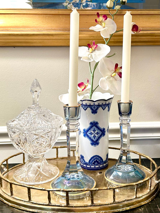 Pair of statuesque iced blue candlesticks with gold rim detailing