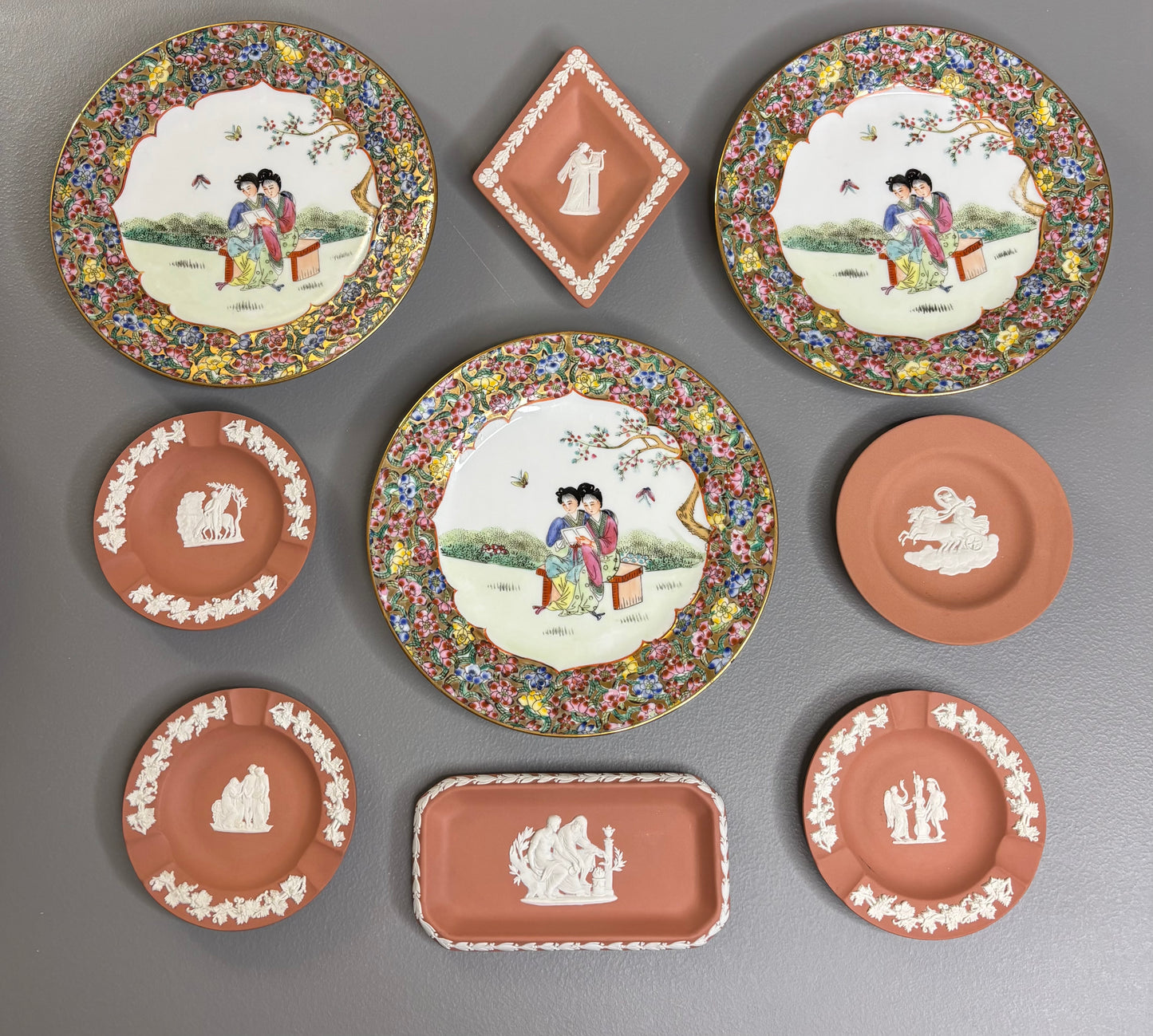 Beautiful instant plate wall! Includes 3 Famille Rose plates and 6 Wedgwood terra cotta dishes!