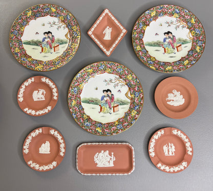 Beautiful instant plate wall! Includes 3 Famille Rose plates and 6 Wedgwood terra cotta dishes!