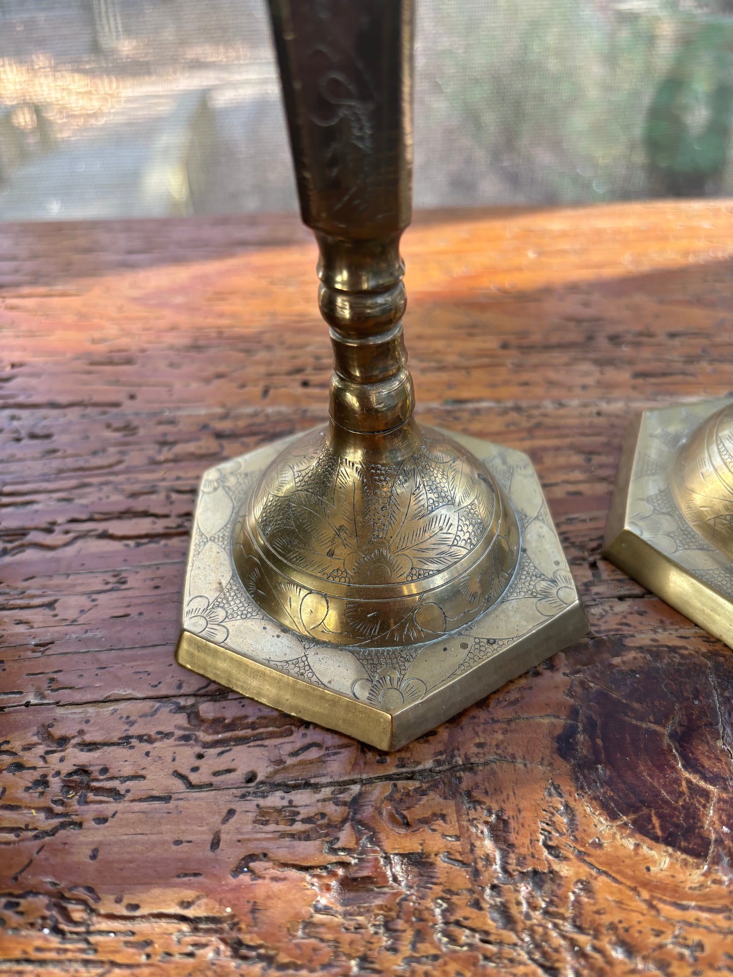 Beautiful pair of etched floral and leaves brass candlesticks!