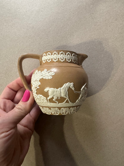 Light brown Wedgwood antique pitcher with hunting scene 4”