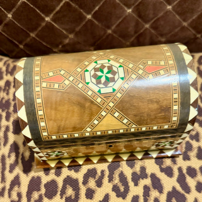Charming inlaid wood lidded box.