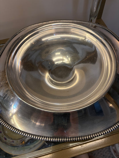 Lovely silver Rockford and Co. flower frog display!