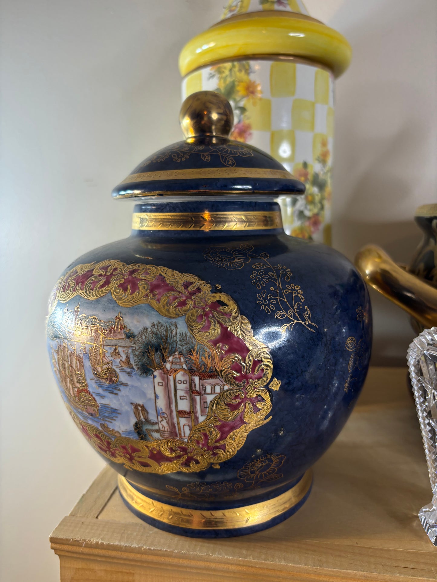 Cobalt lidded jar featuring ship scenes and gold details!