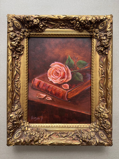 Rose on a book antique style