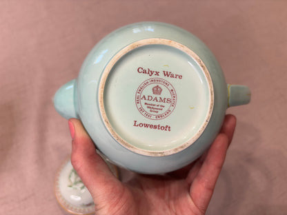 Antique Adams Calyx Ware teapot in the Lowestoft pattern featuring a mint green or duck egg blue color with floral patterns! As is!