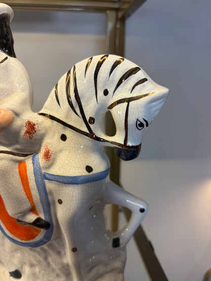 Lovely Staffordshire figurine on horse of girl holding a lamb!