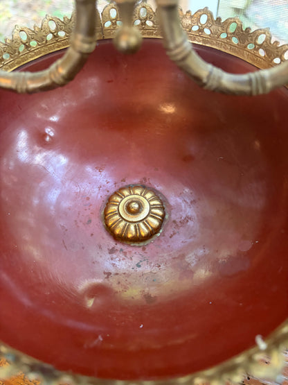 Lovely decorative brass centerpiece bowl or tazza featuring a reddish-maroon enameled body!