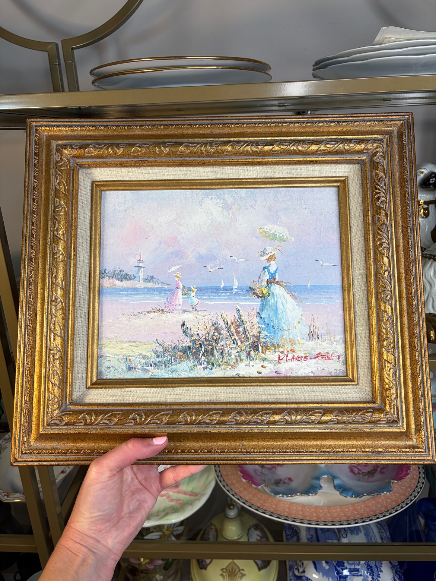 Gorgeous signed and framed art featuring a seaside scene!