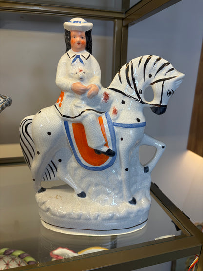 Lovely Staffordshire figurine on horse of girl holding a lamb!