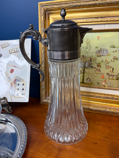 Vintage carafe cut glass pitcher with silver top!