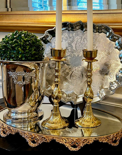 Statuesque vintage shiny brass tall pillar candlestick holders