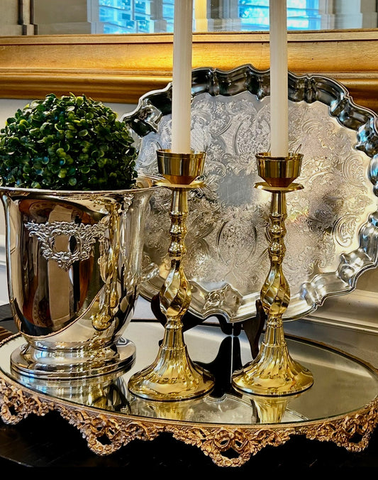 Statuesque vintage shiny brass tall pillar candlestick holders